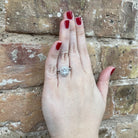 1.03 CTW Oval Lab Grown Diamond Ring with Double Halo and Split Shank on model