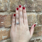 1.53 CTW Lab Grown Diamond Engagement Ring with Halo and Side Accents on model