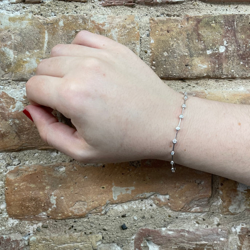 14KW Beaded Bangel with Diamond Station Flowers 3/8 CTW on model