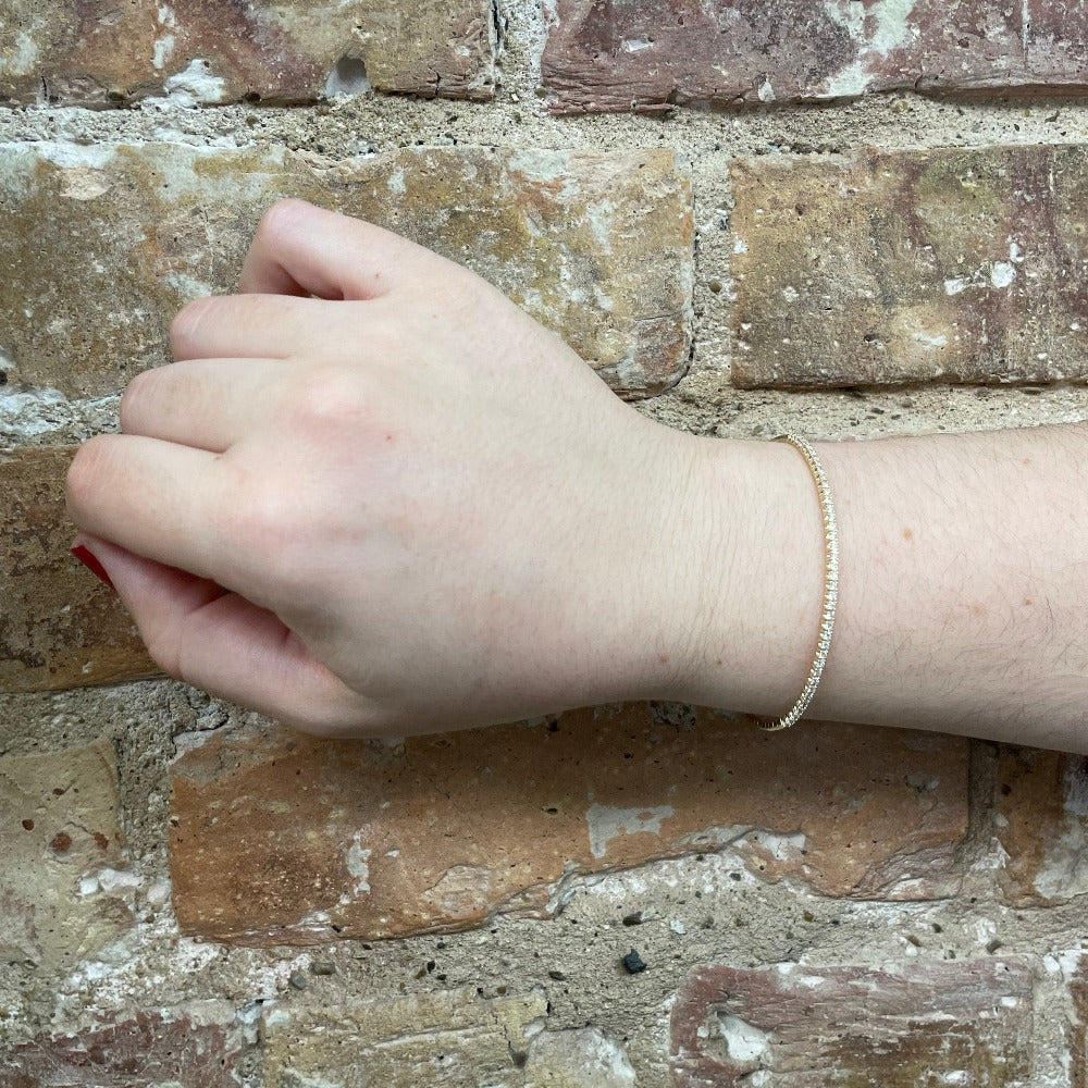 14K Yellow Gold Flexible Diamond Bangle 1/2 CTW on model