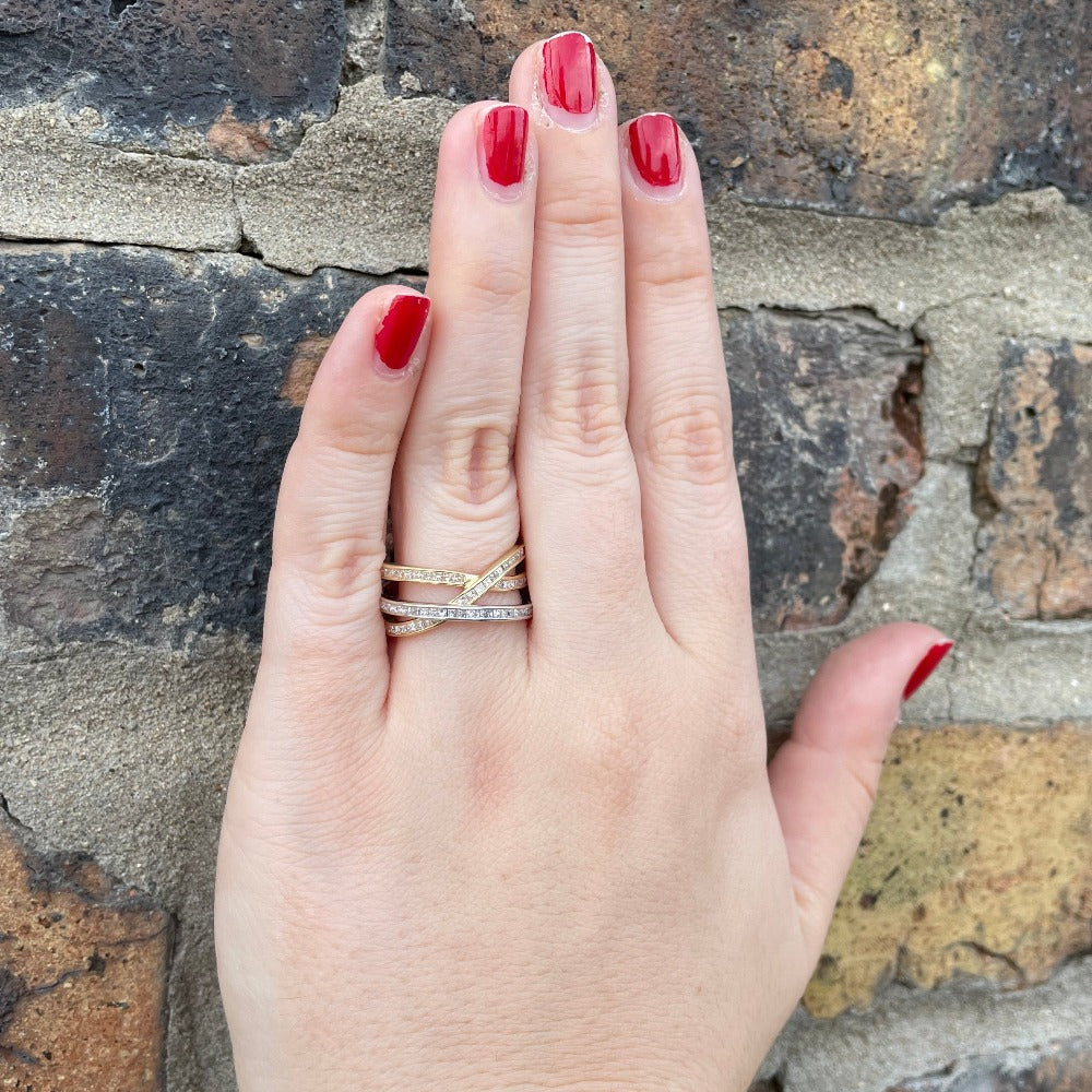 14K Two-Toned Cross Over Ring with Princess Cut Diamonds .38 CTW on model