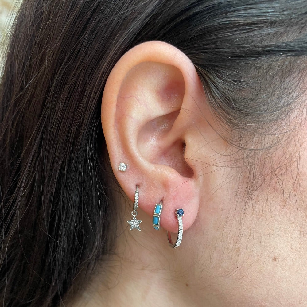 14KW Diamond Hoop Earrings with Blue Sapphire Accent on model