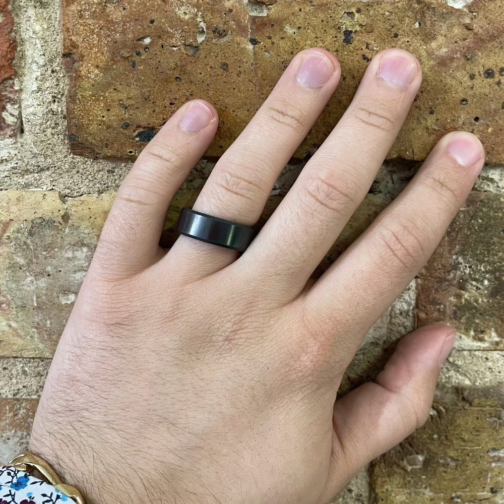 Men's 8mm Crushed Black Diamond Band on hand
