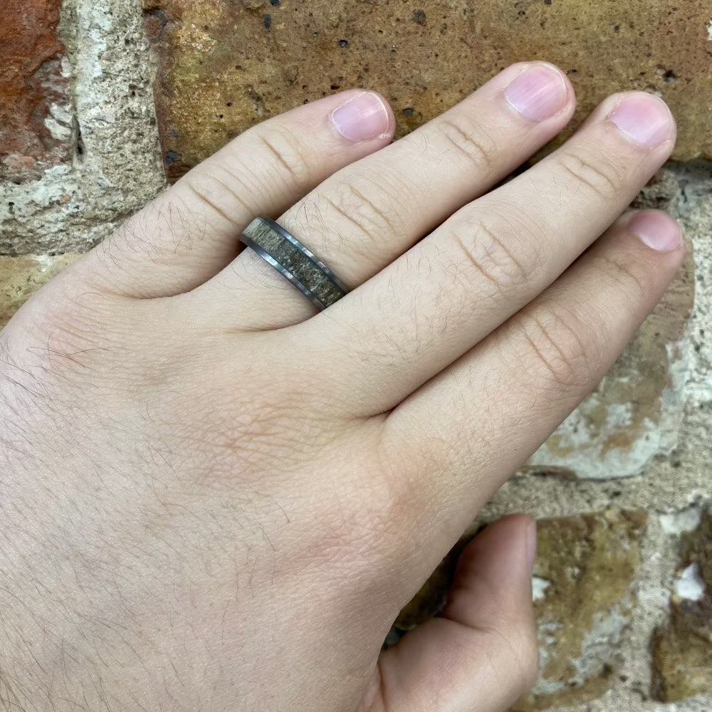 Men's 6mm Tantalum Band with Antler Inlay on hand