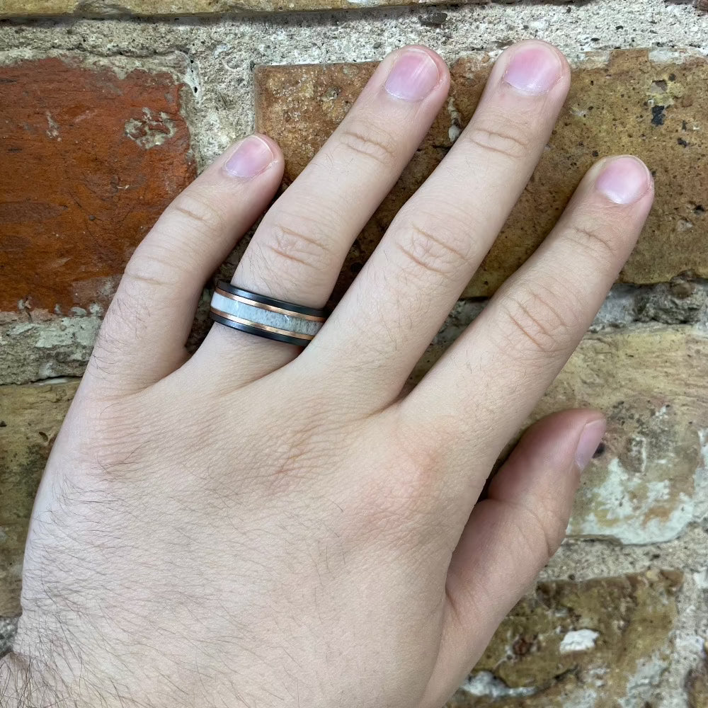 Men's 8mm Black Zirconium Band with Antler and 14K Rose Gold on hand