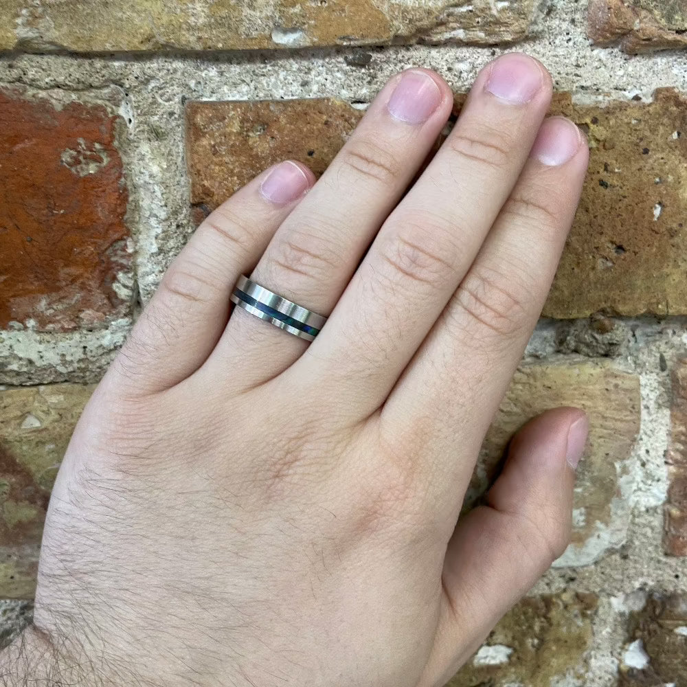 Men's 6mm Minimalist Cobalt Band with Abalone Inlay on hand