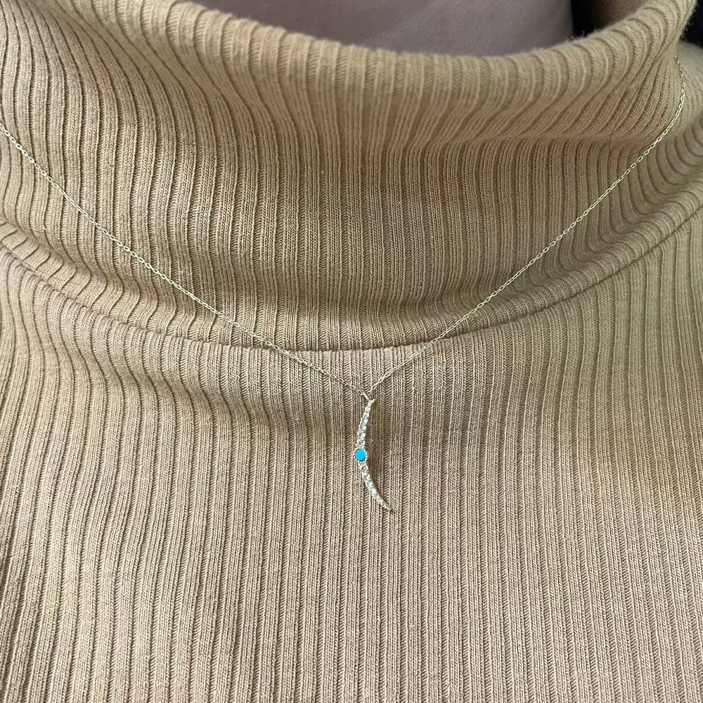 turquoise and white sapphire moon on model