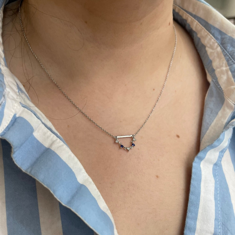 14KW Bar with Diamond and Blue Sapphire Dangle Pendant on a model