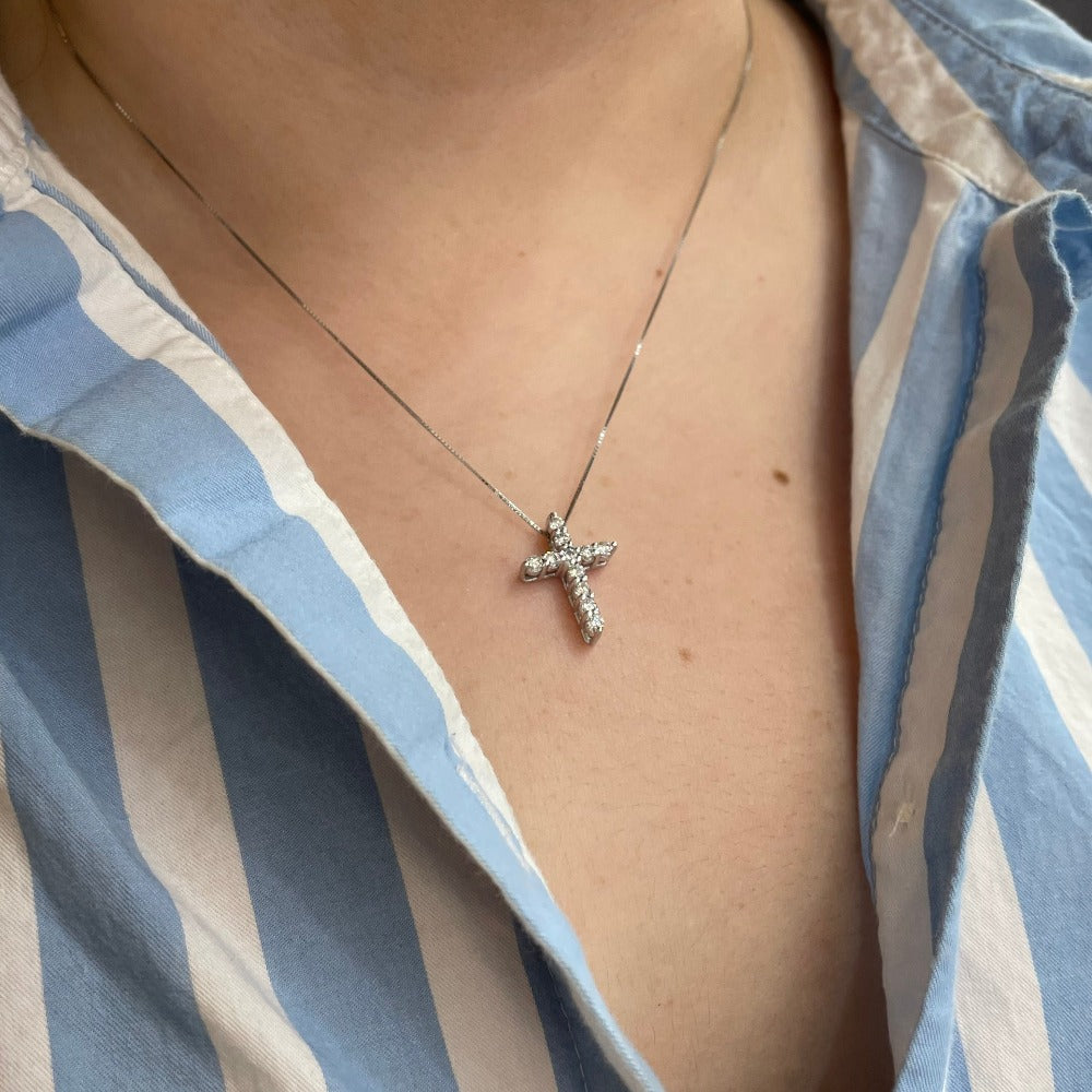 14K White Gold Diamond Cross Pendant .58 CTW on a model