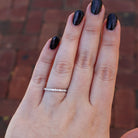 1/4 ctw shared prong band on hand