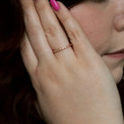 10K Rose Gold Square and Marquise Shaped Diamond Band on model hand