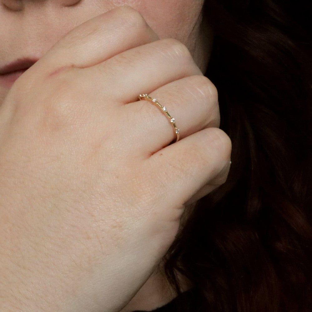 1/10ctw gold and diamond band on model