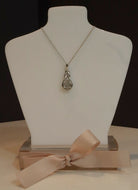 Sterling Silver & Diamond Rhythm Of Love Anniversary Love Knot Pendant