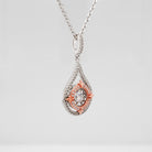 Sterling Silver & CZ Two-Toned Rhythm of Love Fleur-de-Lis Drop Pendant Up Close side view
