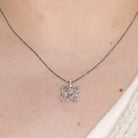 Sterling Silver & Diamond Infinity Heart Love Knot Pendant on model