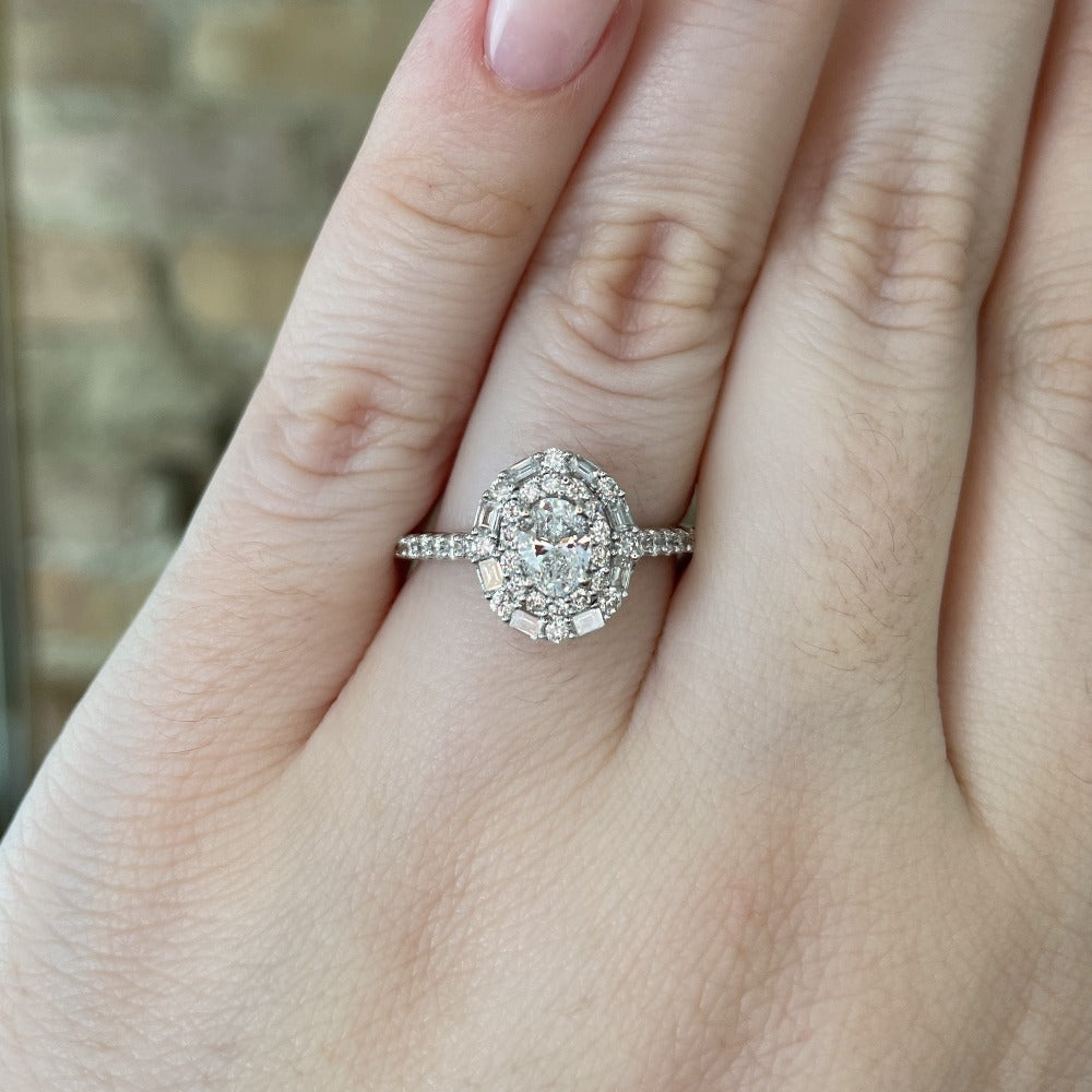 closer, more detailed view of 14kw oval double halo engagement ring on model