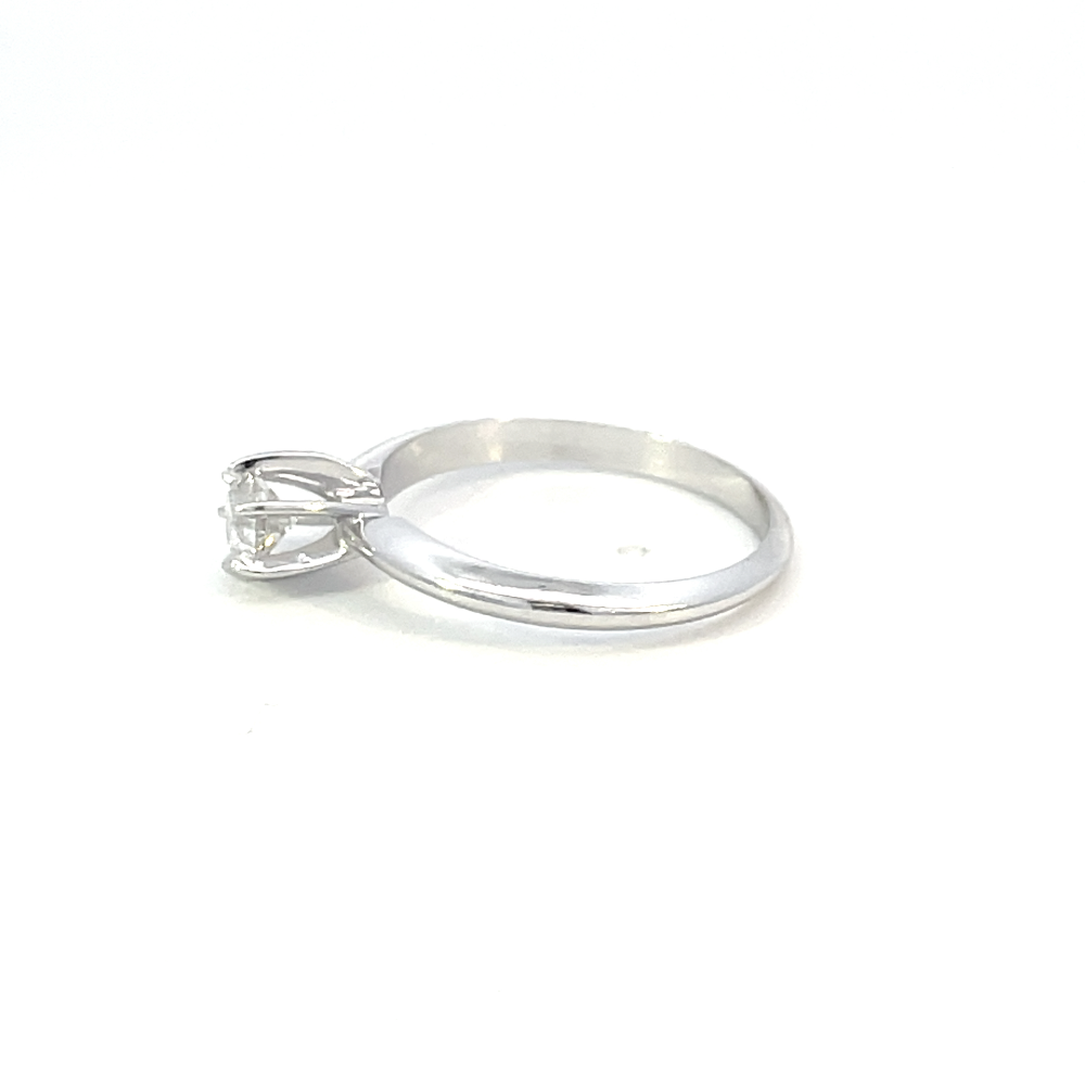 side profile view of 1/3 carat diamond solitaire engagement ring