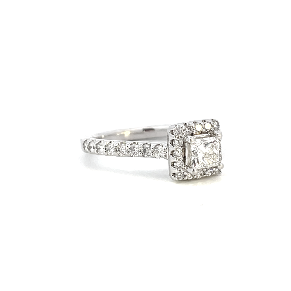 side view of princess cut diamond halo style engagement ring.