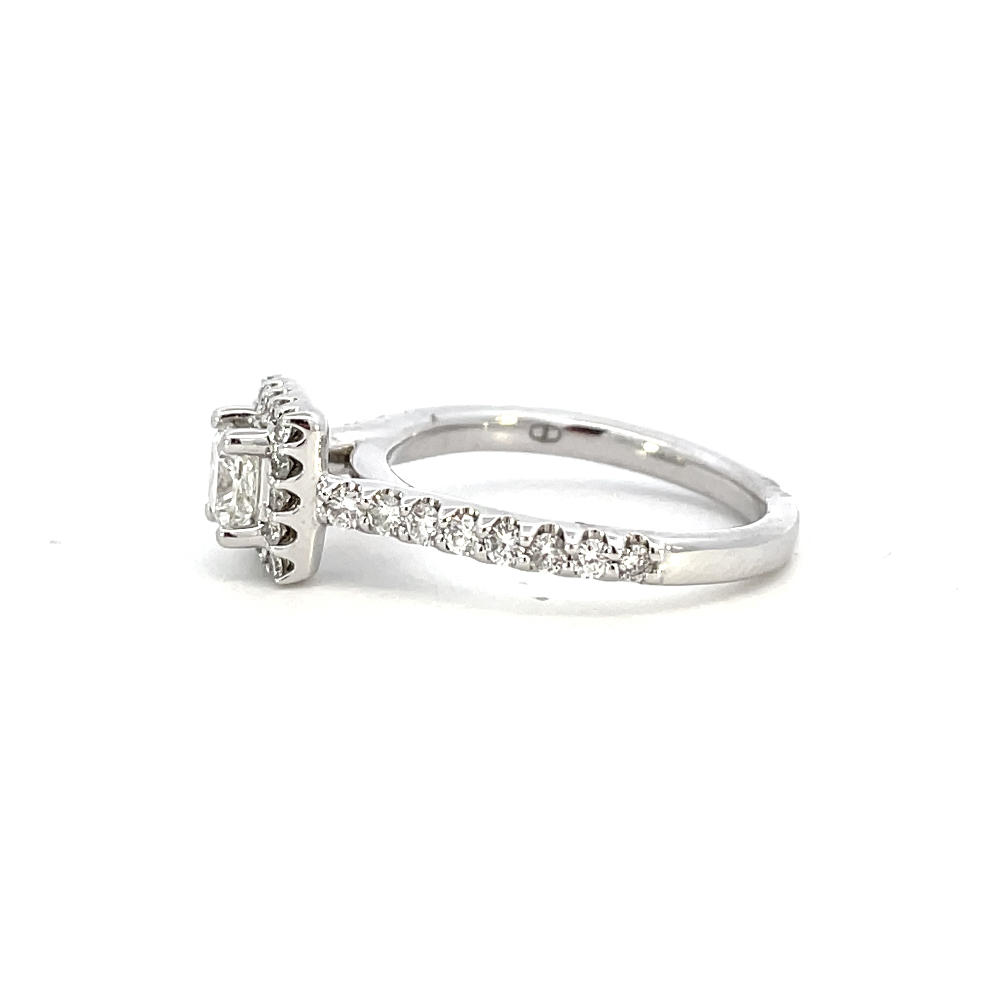 profile view of princess cut diamond halo style engagement ring.