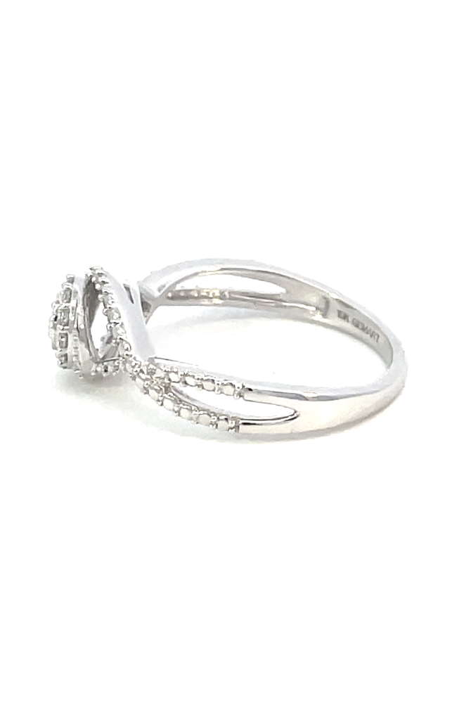 side profile view of 10kw cluster diamond engagement ring with criss cross sides.
