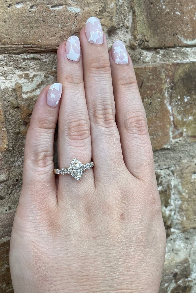 14KY Criss-Cross Style Engagement Ring on hand