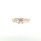 front view of 14ky SallyK diamond engagement ring with round center and pear accents