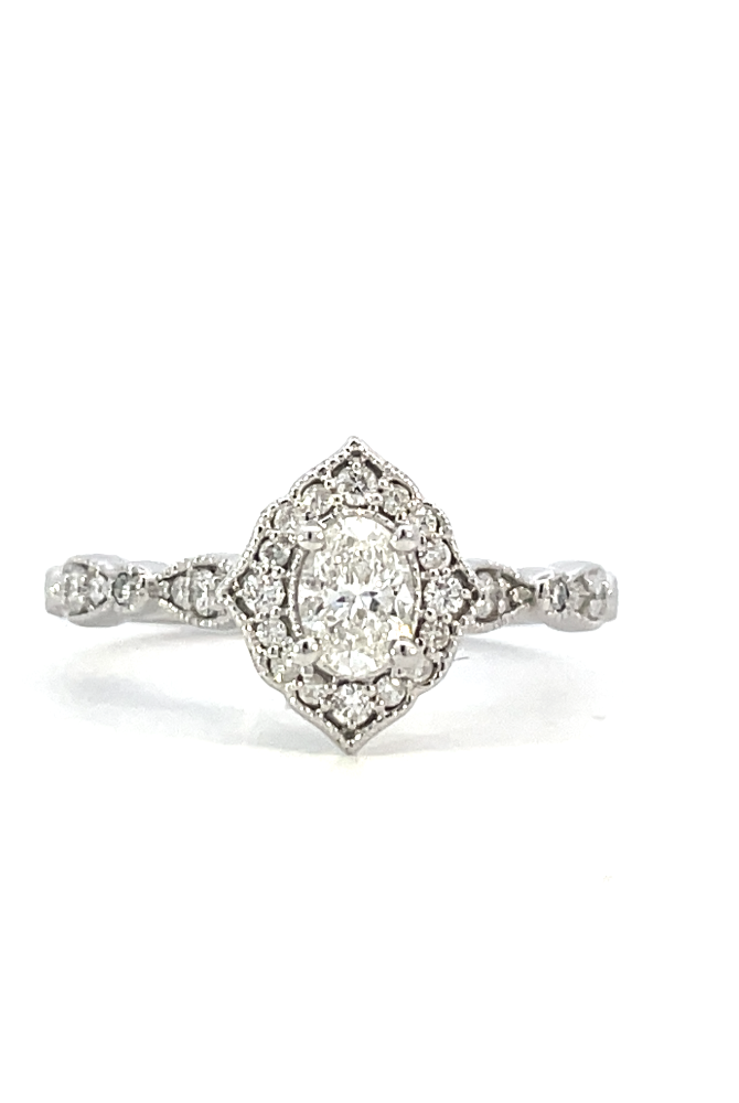 front view of vintage inspired halo engagement ring with oval center stone.