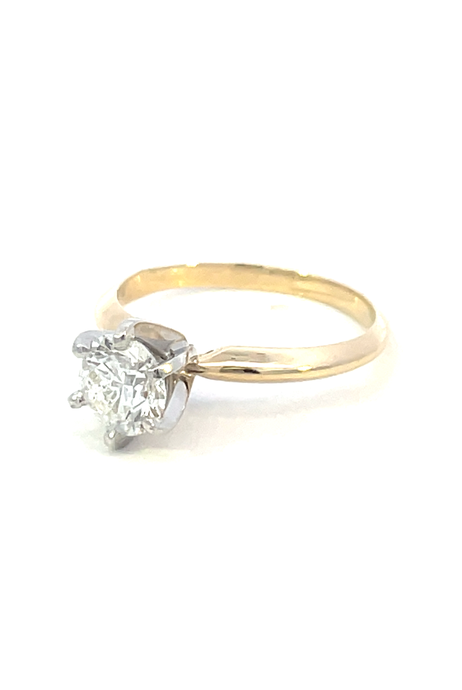 side view of 14ky 1.01 ct round diamond solitaire engagement ring.