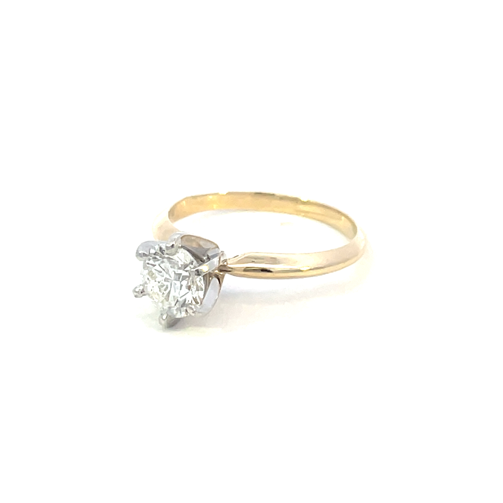 side view of 14ky 1.01 ct round diamond solitaire engagement ring.