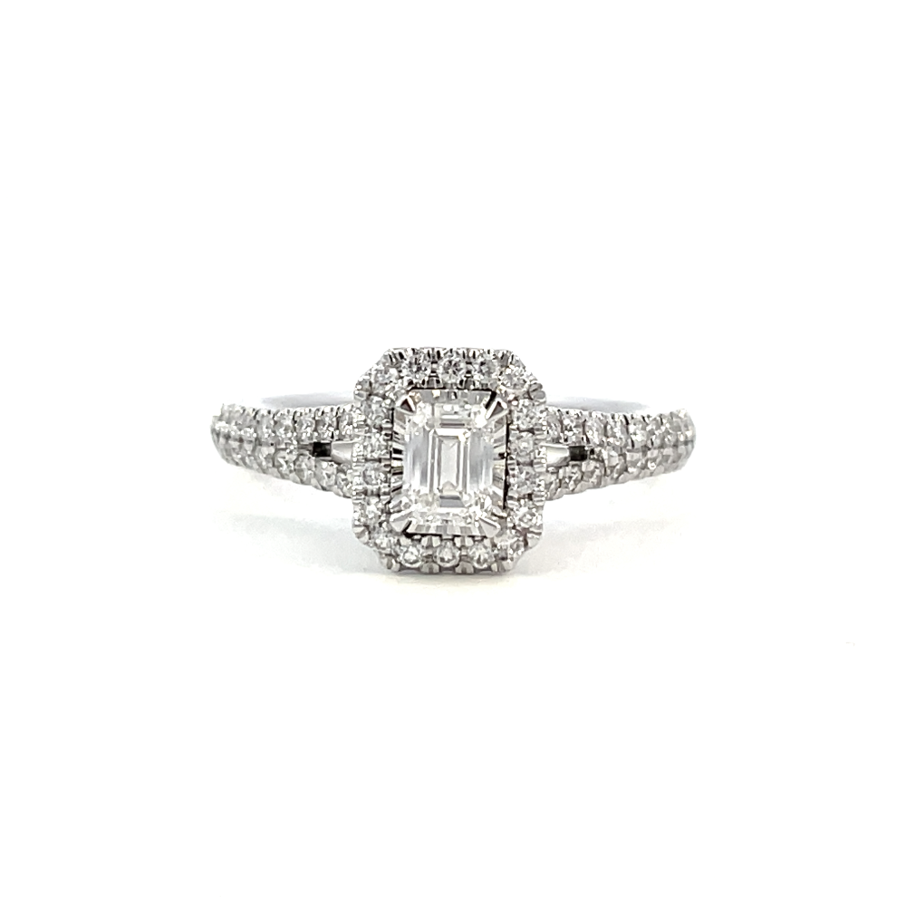front view of 14kw emerald cut halo style engagement ring with split shank
