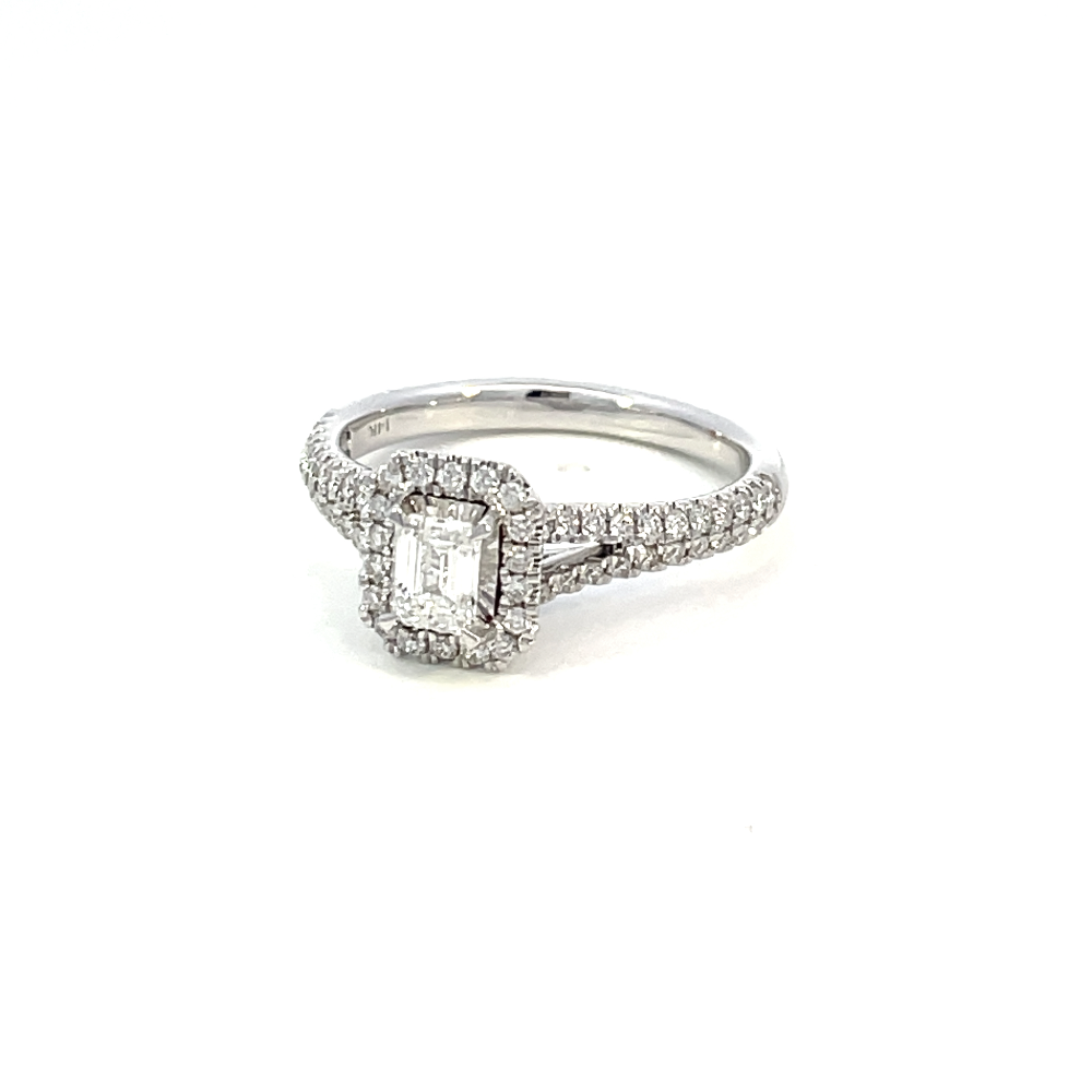 side angle view of 14kw emerald cut diamond halo style engagement ring with split shank