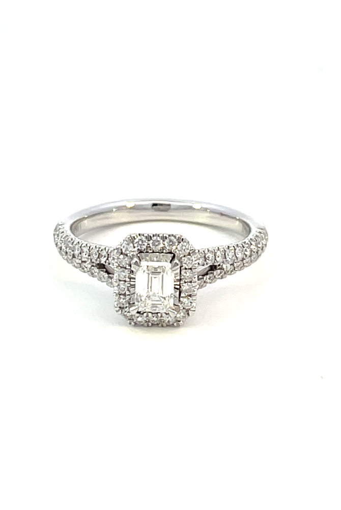 top view of 14kw emerald cut halo style engagement ring with split shank