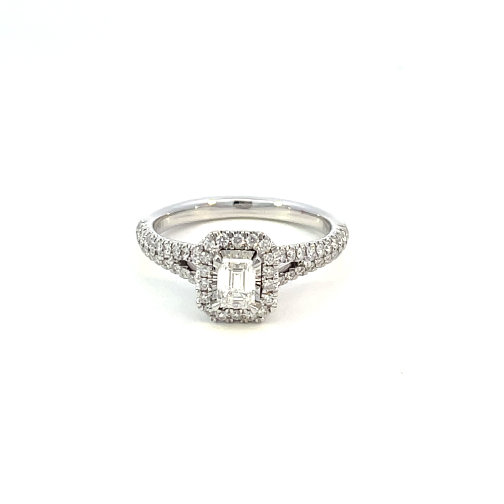 top view of 14kw emerald cut halo style engagement ring with split shank