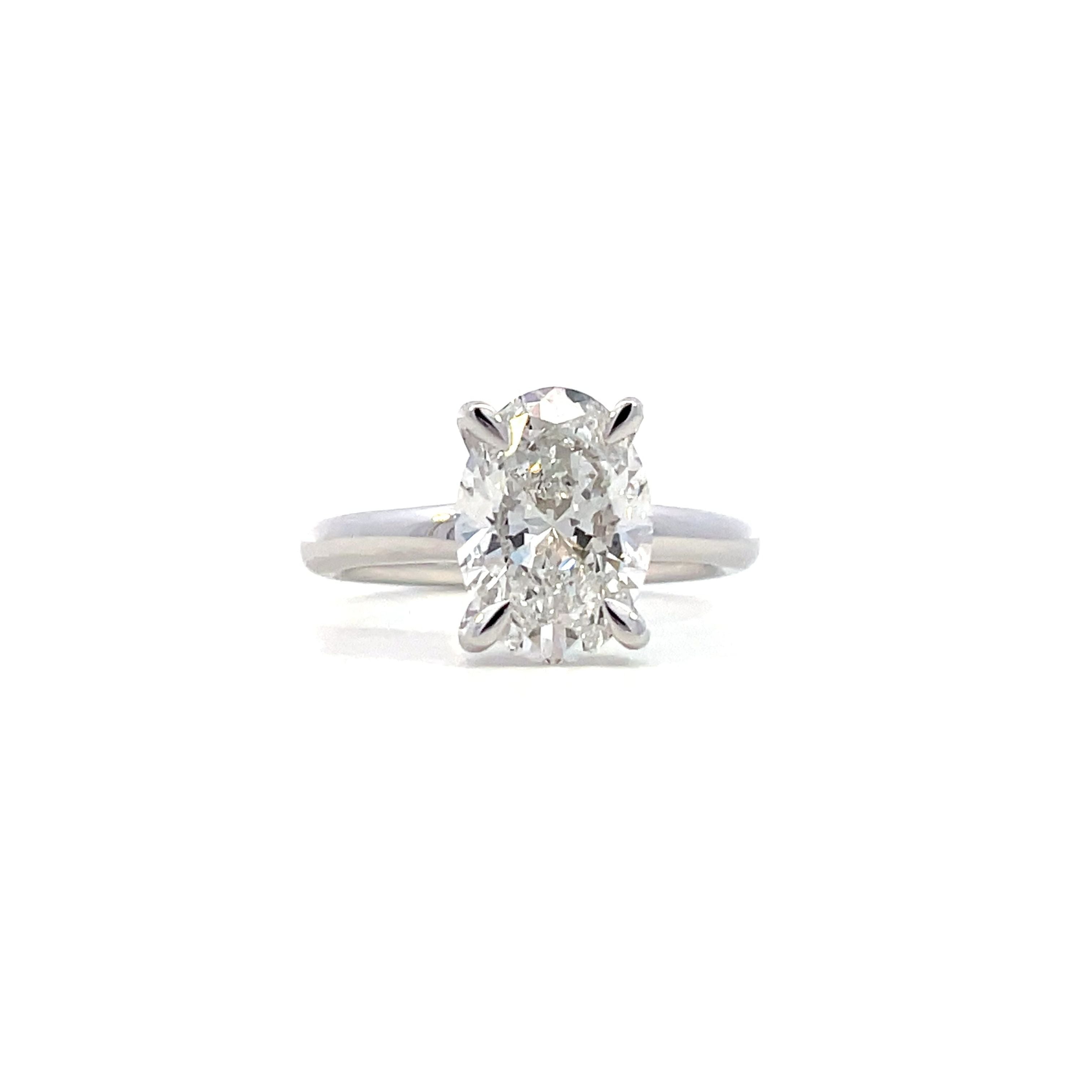 White Gold & Diamond Oval Solitaire Engagement Ring