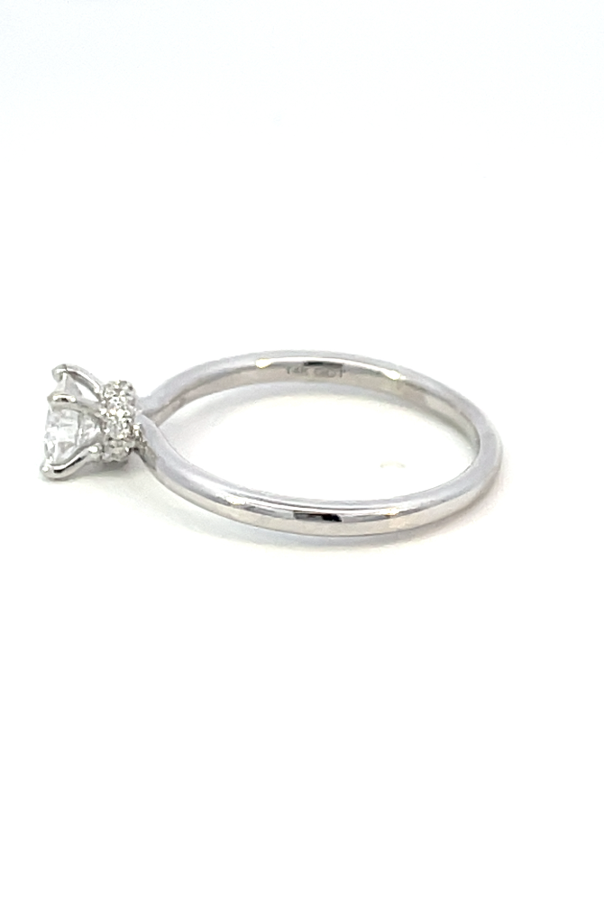 side profile view of 14kw SallyK accented solitaire engagement ring showing 14k stamp on inside of band.