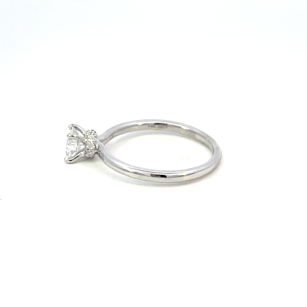 side profile view of 14kw SallyK accented solitaire engagement ring showing 14k stamp on inside of band.