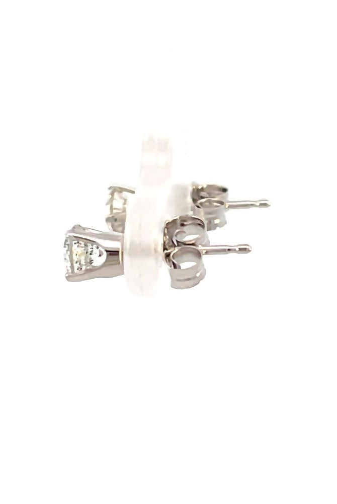 side view of Forever Fernbaugh's 3/4ctw diamond stud earrings