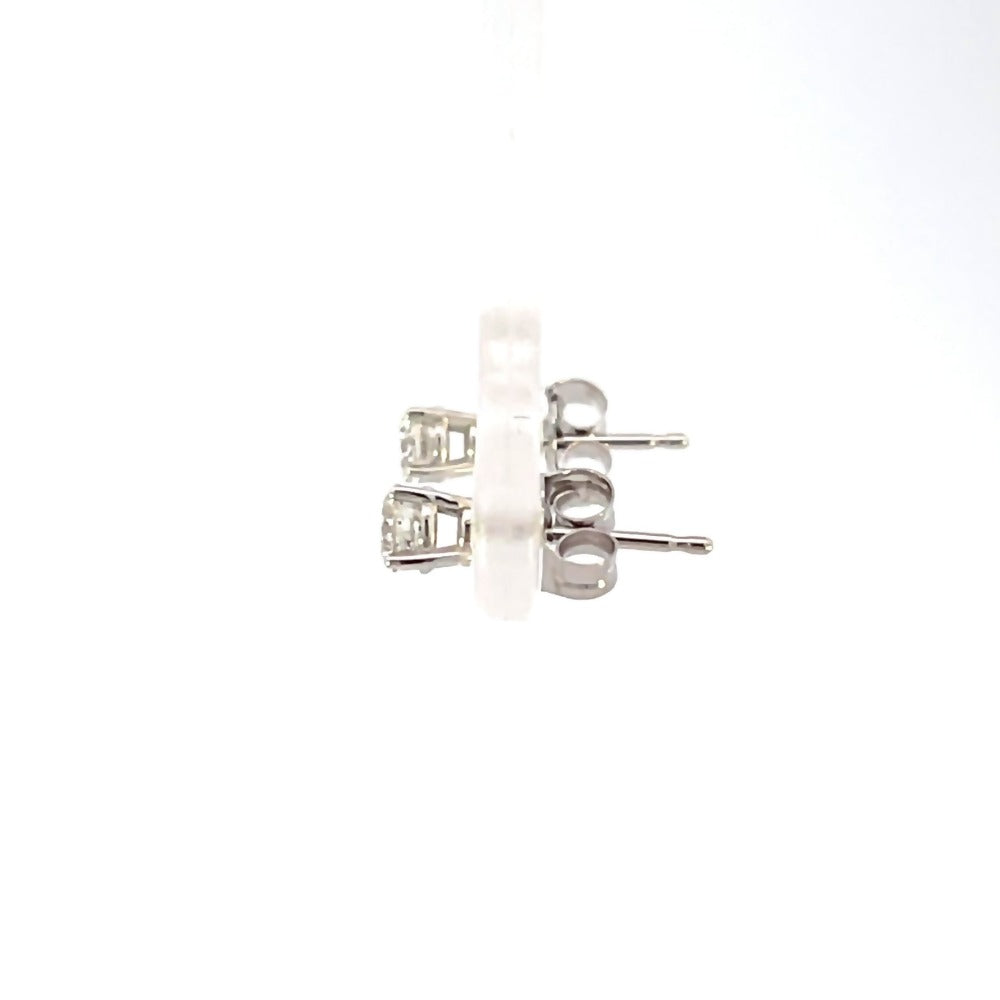 side view of 1/3ctw Fernbaugh's signature diamond stud earrings