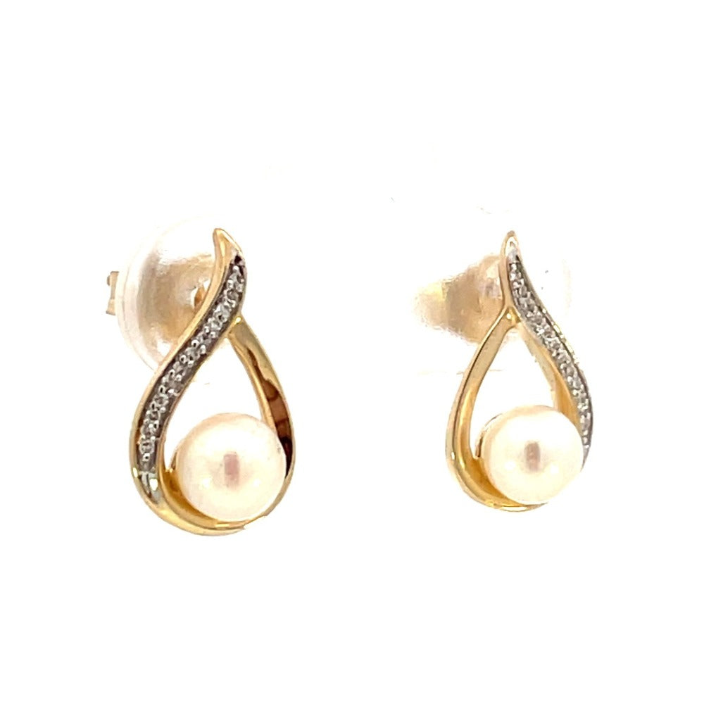 14KY Tear Drop Shaped Pearl and Diamond Earrings 1/20 CTW side 1