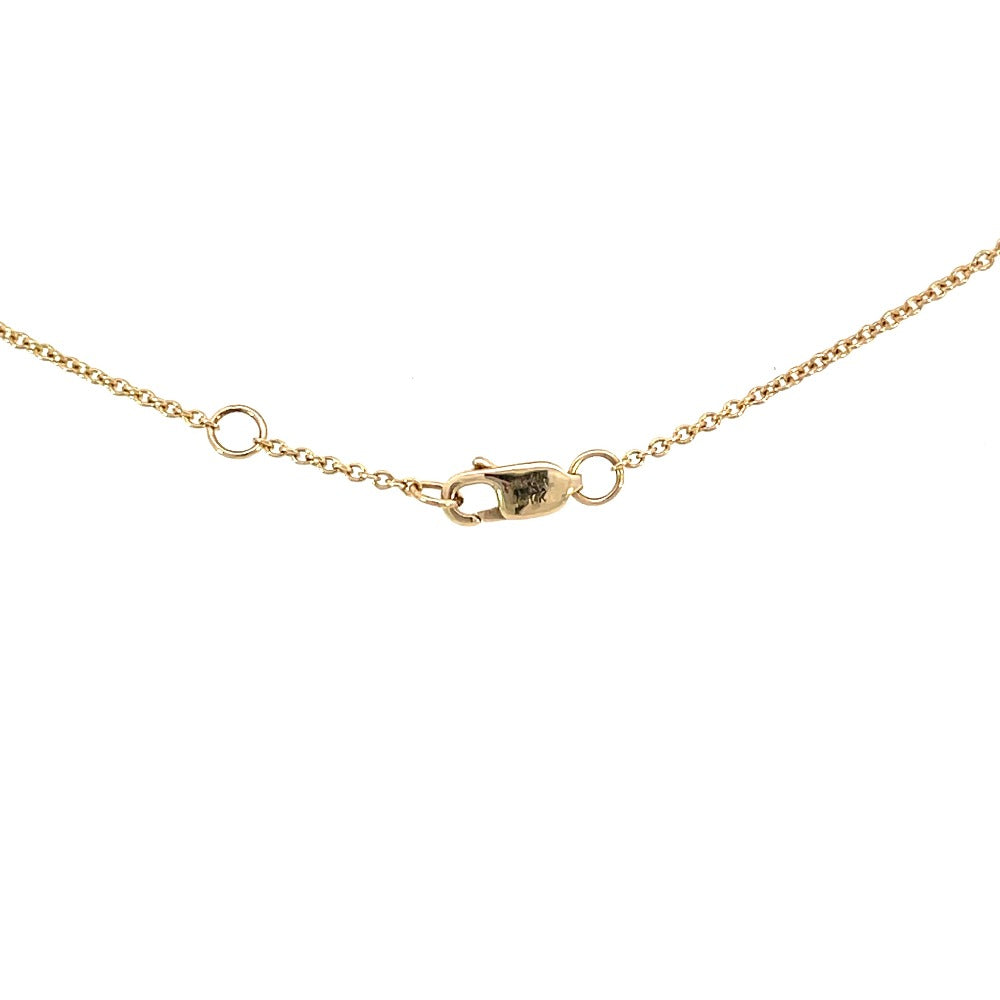 view of the lobster clasp and adjustable chain on the 14k two-toned gold anklet.
