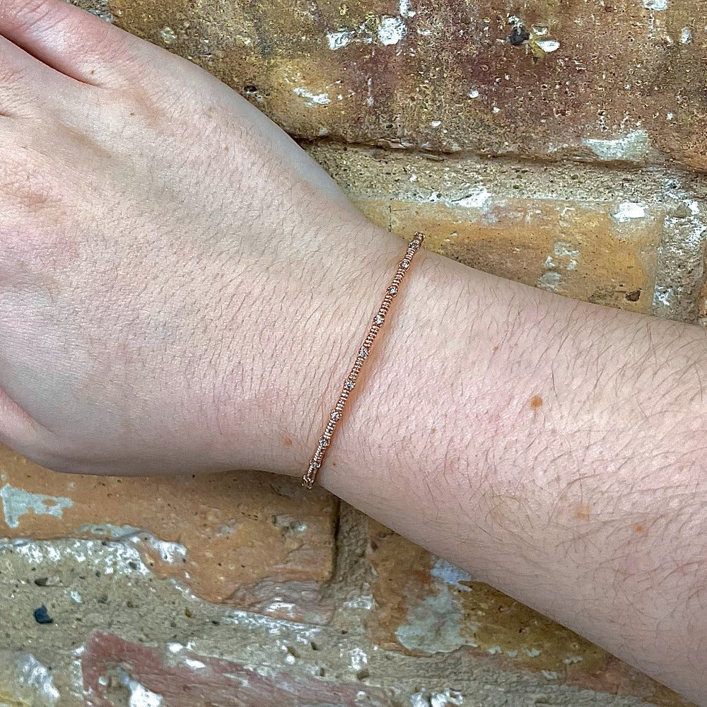 rose gold bangle on the wrist