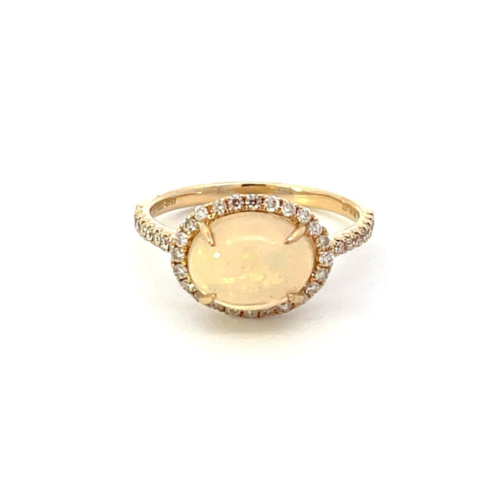 Oval Opal and Diamond Halo Style Ring