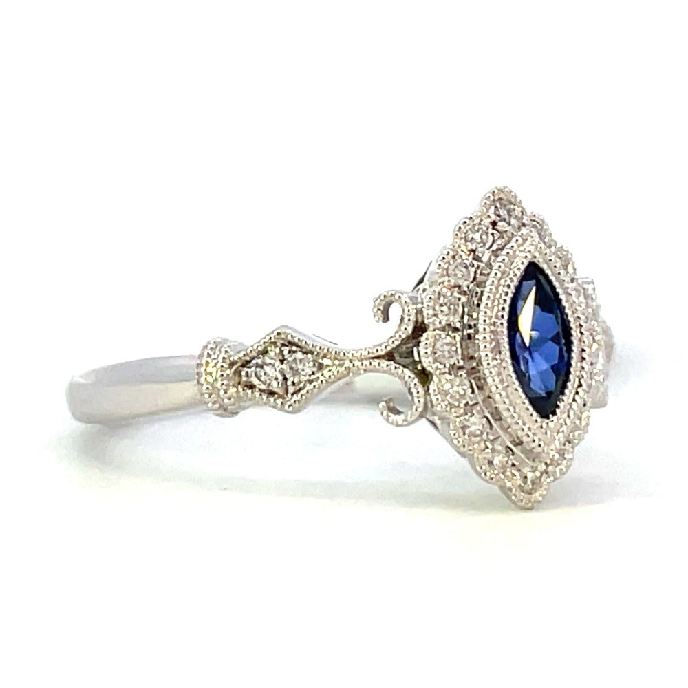 14KW Blue Marquise Sapphire and Diamond Ring .11 CTW side 1
