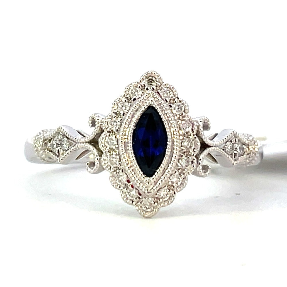 14KW Blue Marquise Sapphire and Diamond Ring .11 CTW