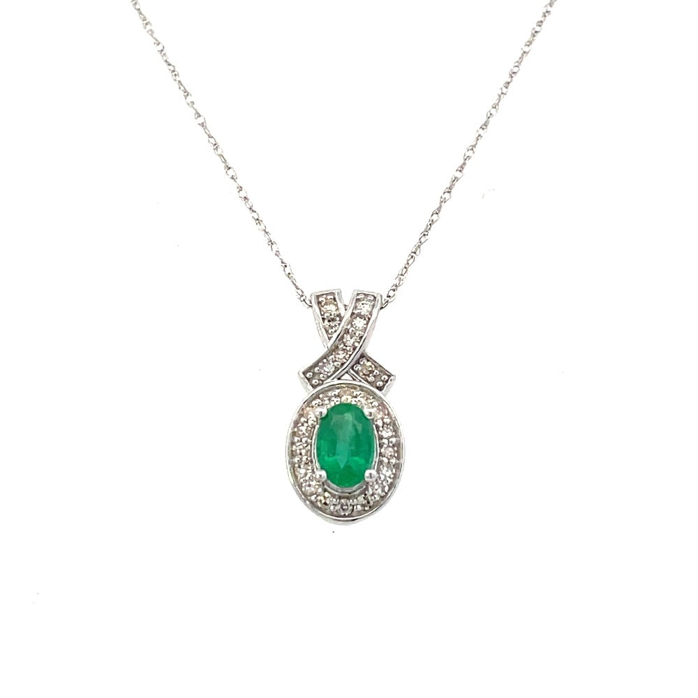 10KW Oval Lab Grown Emerald and Diamond Pendant 1/5 CTW on model