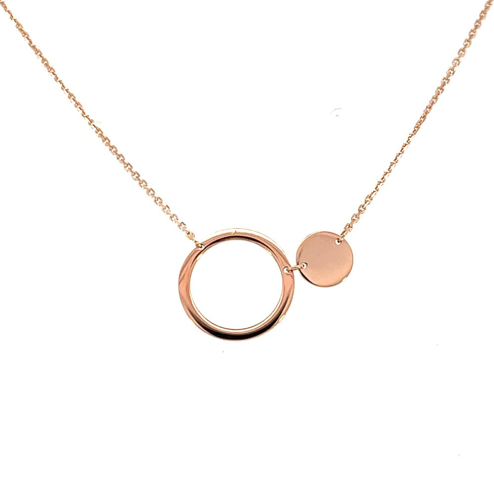 front view of rose gold variant of 14k gold solid and open circle necklace