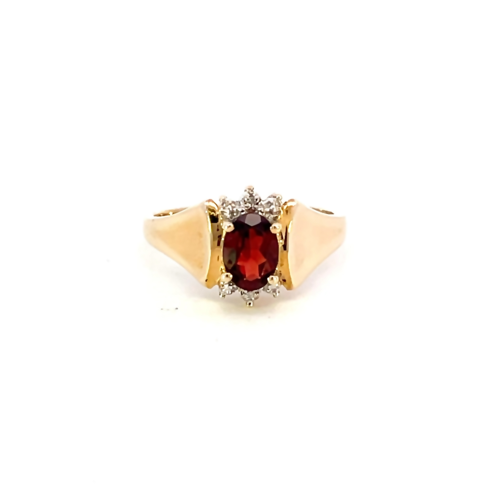 front view of 10k yellow gold garnet and diamond ring