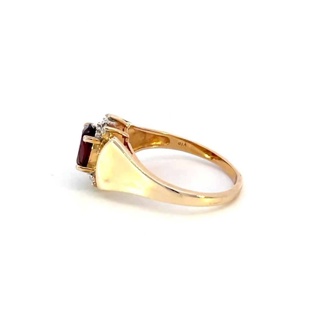 side view of 10k yellow gold garnet and diamond ring