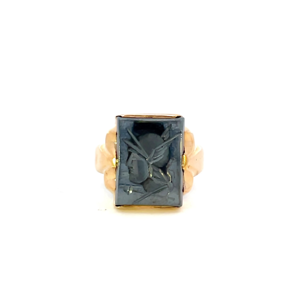front view of 10 karat yellow gold mens ring with carved black center stone