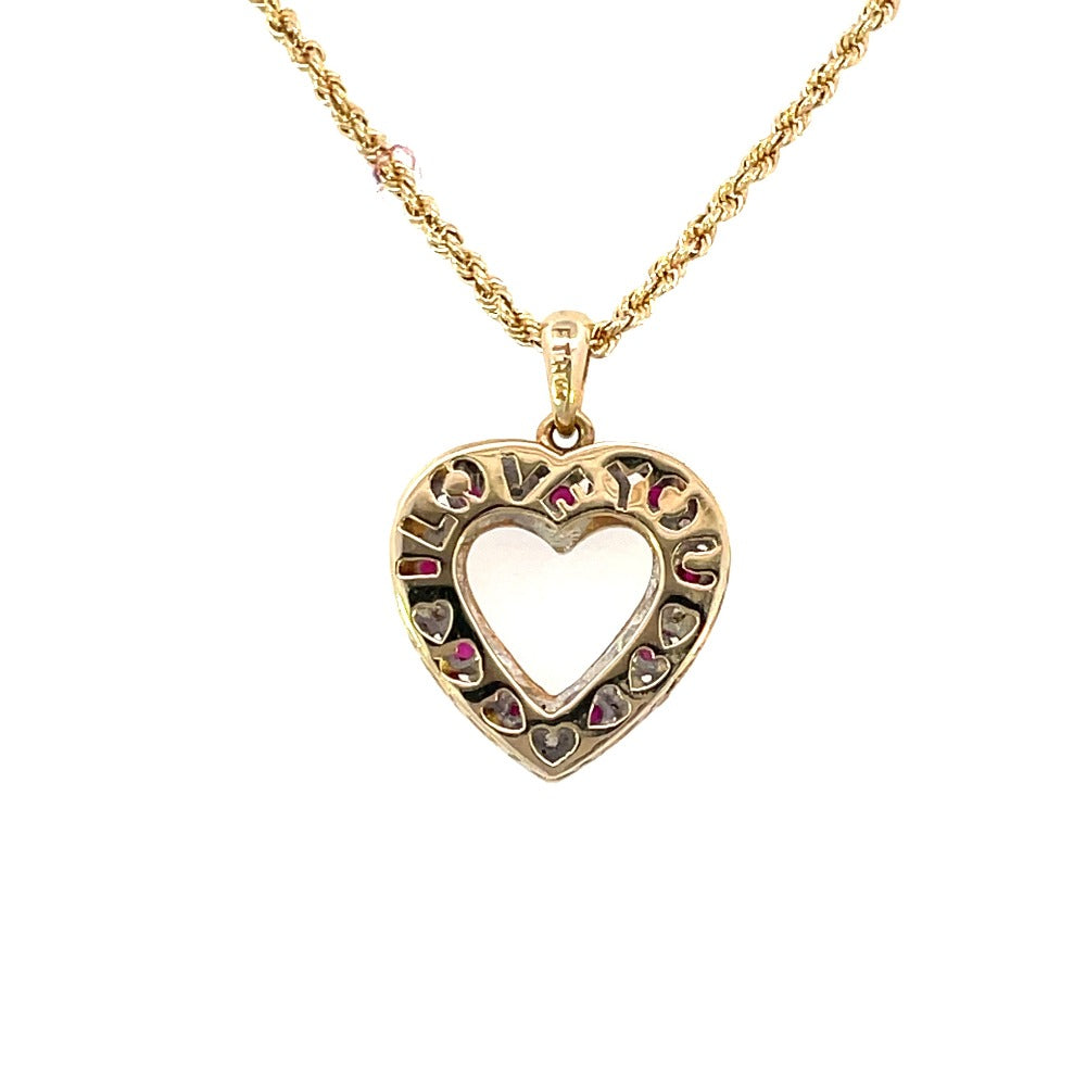 back view of yellow gold heart pendant that shows the cut-out message that says "I Love You"